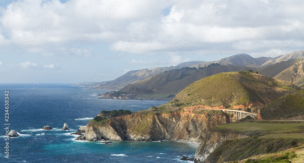 nature and landscape concept - beautiful view of big sur coast in california and bixby creek bridge