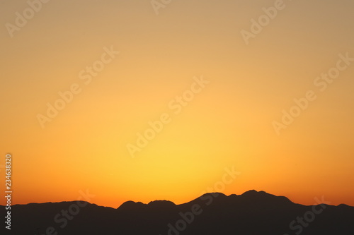 View from Enoshima island to mountain silhouettes with dramatic sunset  Fujisawa  Kanagawa prefecture  Japan
