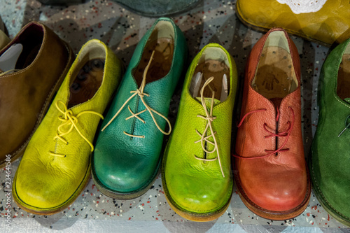 handmade shoes standing in a row
