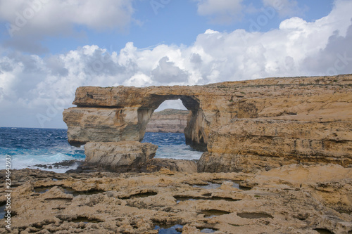 Azure window  natural hole of rocky cliff and blue Mediterranean sea. Famous travel destination of Malta on Gozo island