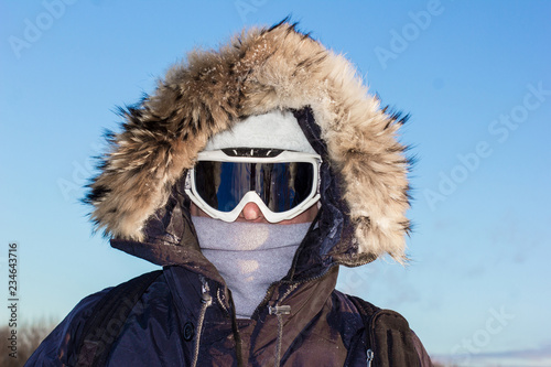 portrait of man in ski goggles and hat