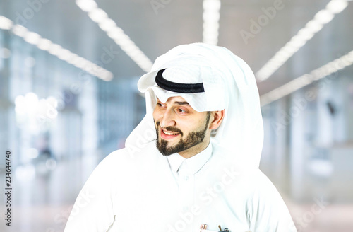Arabian (Gulf area) smiling man with traditional wear.
