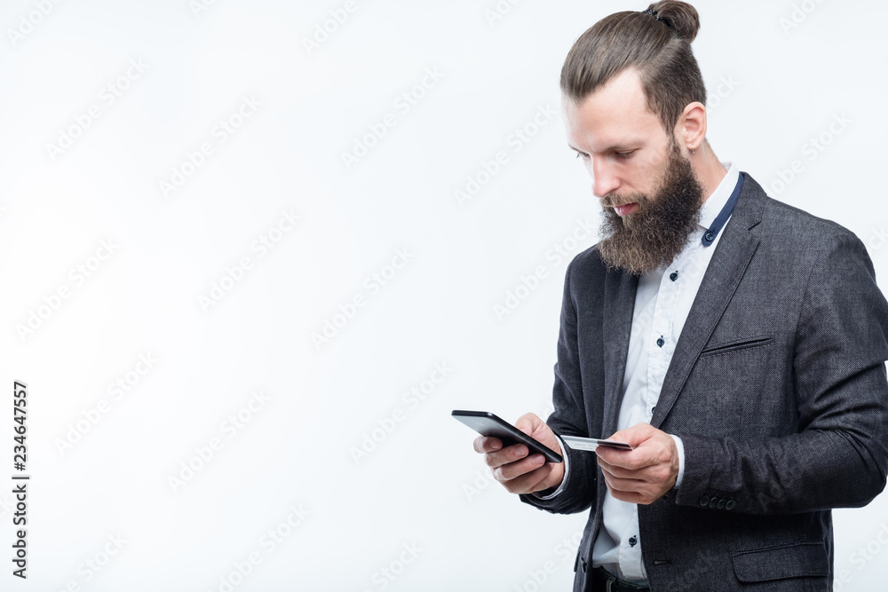 mobile payment and nfc transactions. digital finance. man holding credit card and phone. mobile payment and nfc transactions. digital finance. man holding credit card and phone.