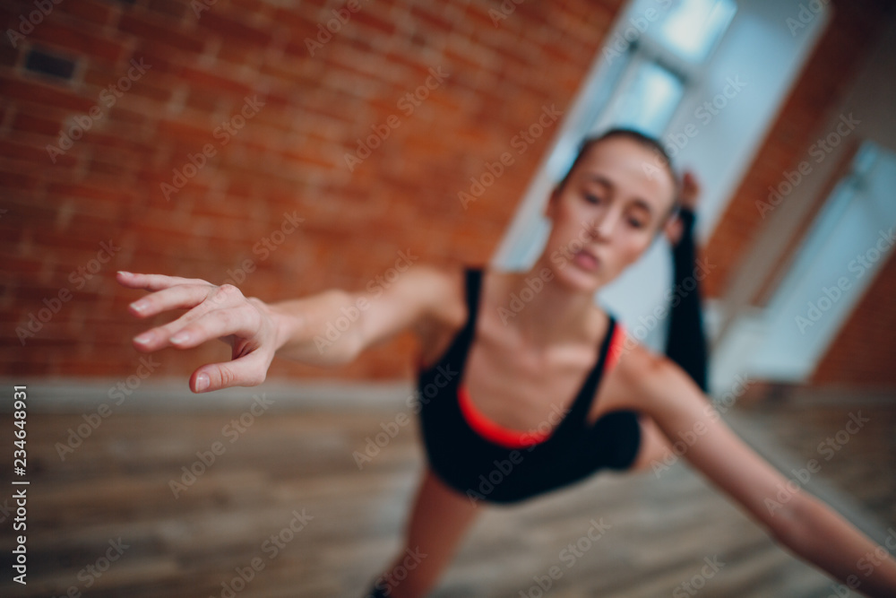 Young woman dancing in a dance studio Young woman dancing in a dance studio