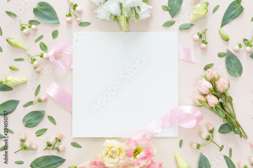 Top view of round flower frame with leaves and copy space isolat