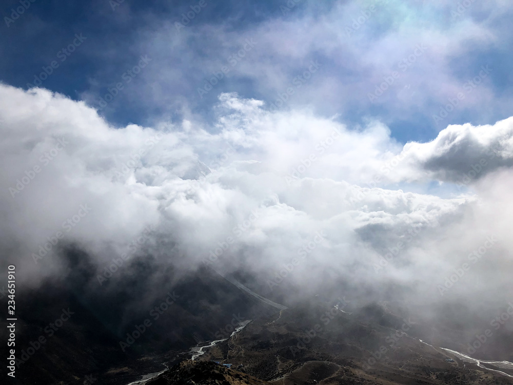 Fototapeta premium Man resting and watching the mountains meditation 
