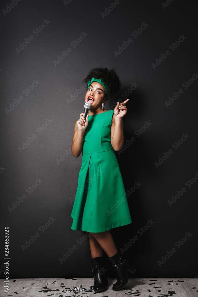 Full length portrait of a cheerful afro american woman Full length portrait of a cheerful afro american woman