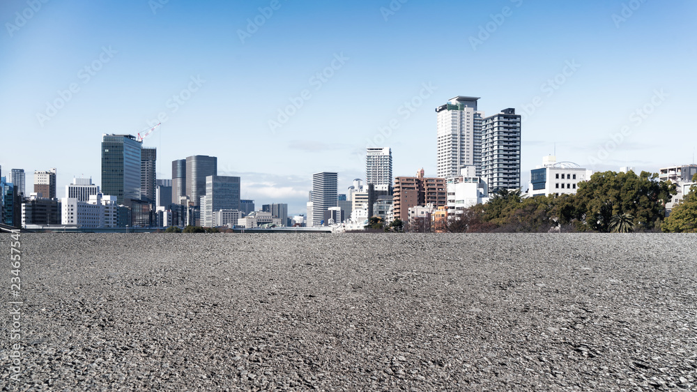 Panoramic skyline and modern buildings with empty road in Japan Panoramic skyline and modern buildings with empty road in Japan