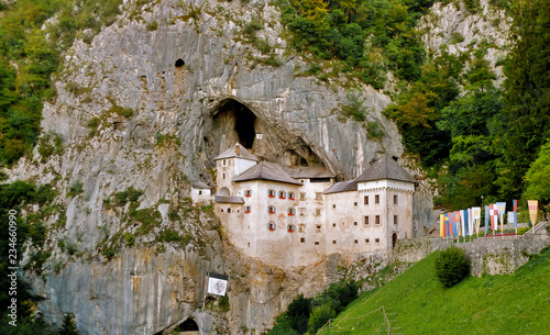 Predjama, Inner Carniola / Slovenia - August 2011: Predjama Castle built within a cave photo