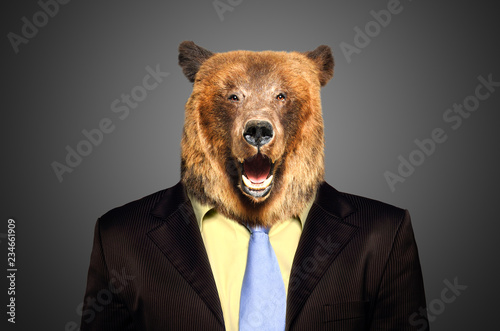 Portrait of a brown bear in a business suit