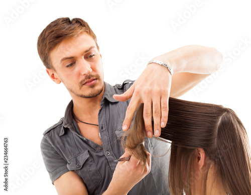 Professional hairdresser with long hair model, isolated on white