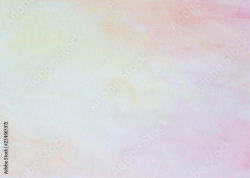 Abstract light watercolor background in pink, yellow and orange with watercolour stains and paper texture.