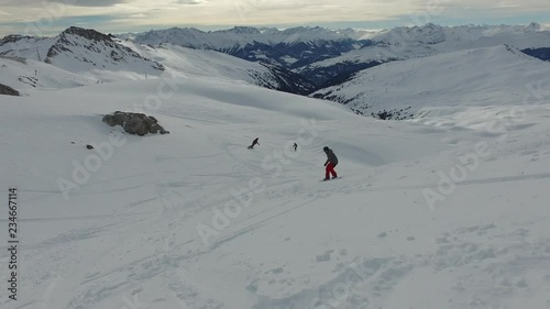 snowboarding through backcountry