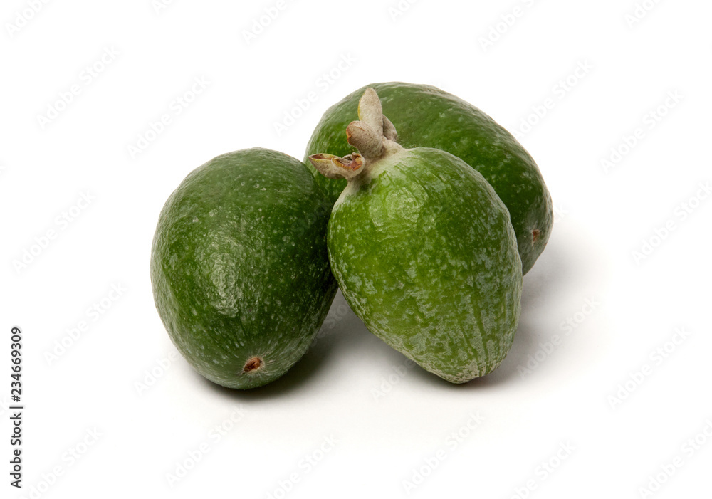 Green feijoa fruits on white background. Green feijoa fruits on white background.