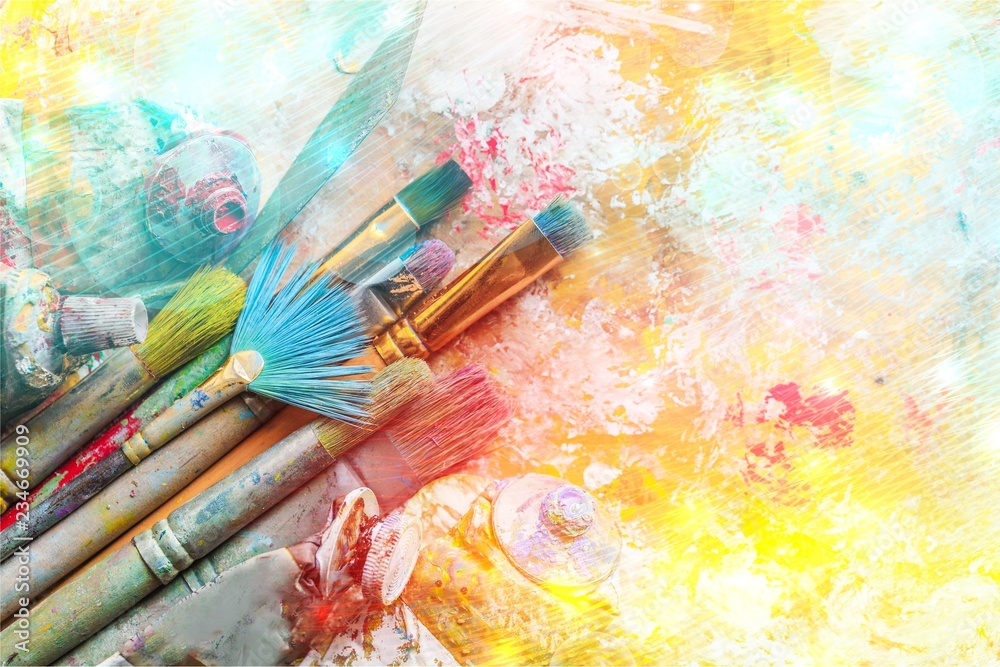 Row of artist paint brushes on background Stock Photo