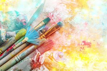 Row of artist paint brushes  on background