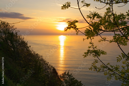 Sunset over sea at Devon, England