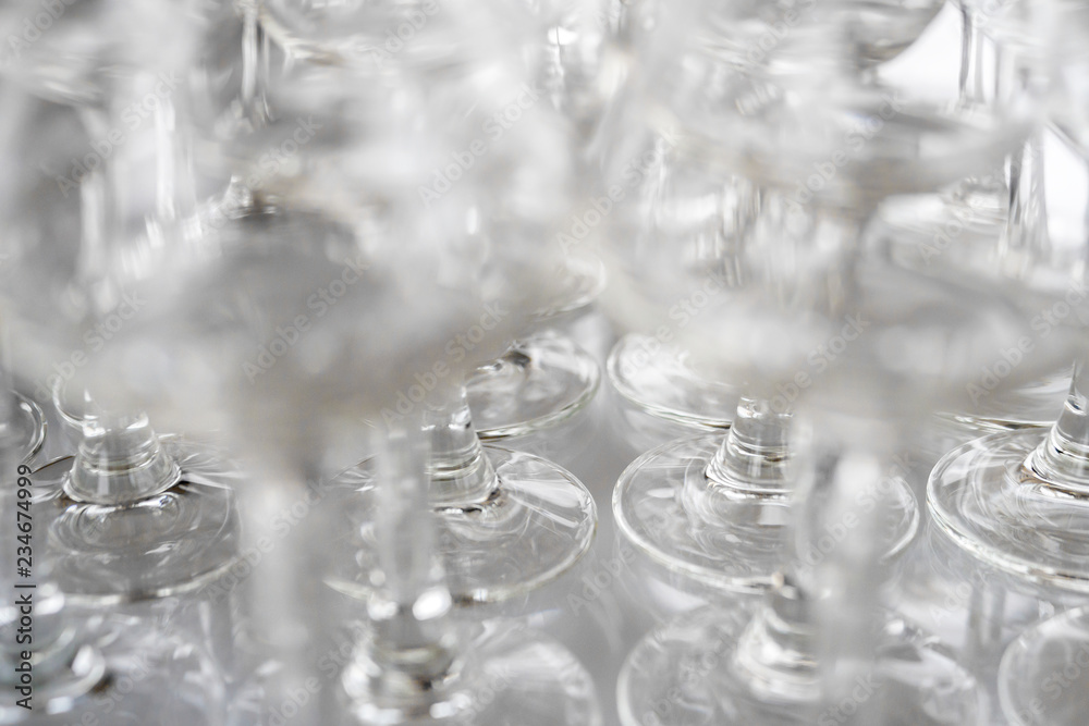 Glass glasses for sparkling wine. On the bar counter, close-up. Glass glasses for sparkling wine. On the bar counter, close-up.