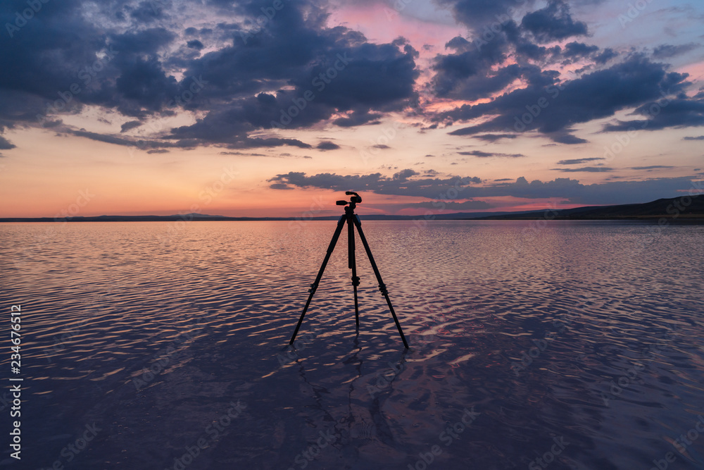 tripod silhoutte on the lake 