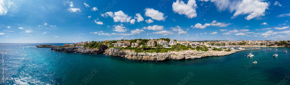 Coast of Porto Cristo with villas and natural harbor, Cala Manacor, Porto Cristo, Mallorca, Balearic Islands, Spain Coast of Porto Cristo with villas and natural harbor, Cala Manacor, Porto Cristo, Mallorca, Balearic Islands, Spain