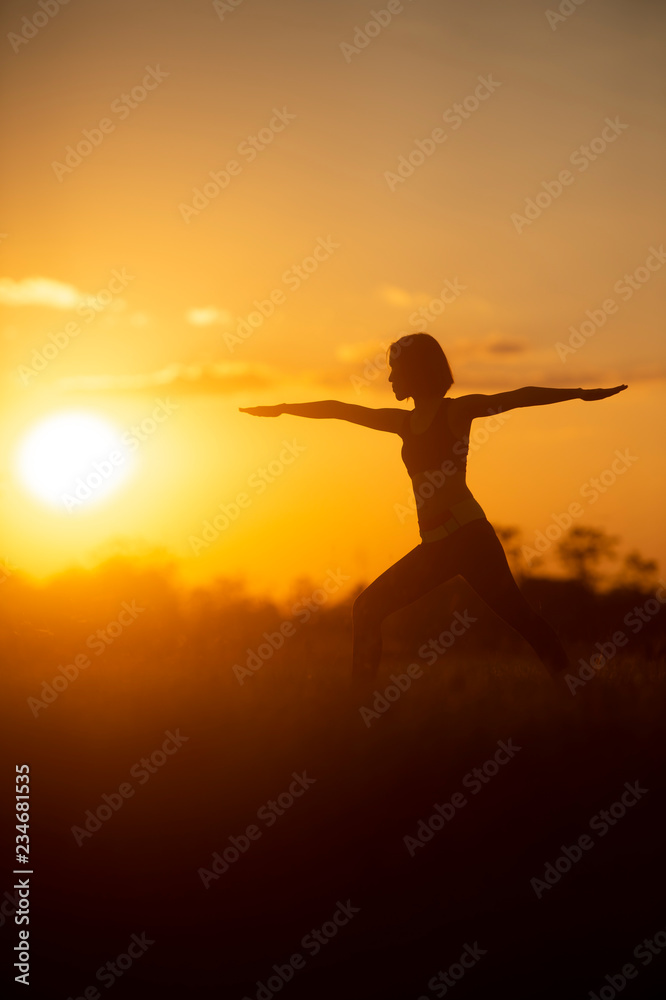 woman exercise in the sunset 
