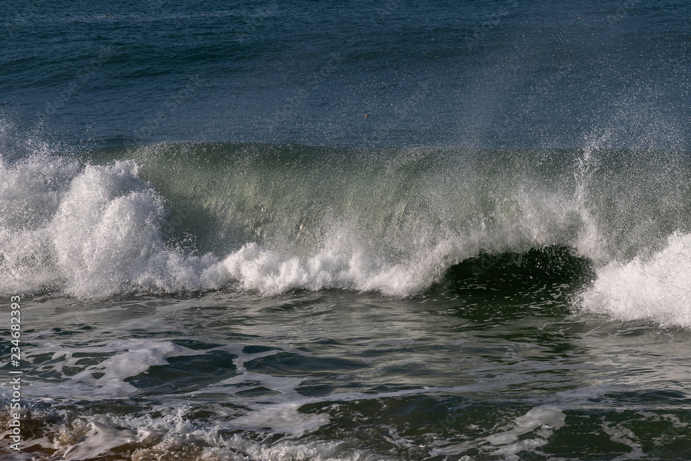 Breaking Atlantic ocean wave, Nazare, Portugal.