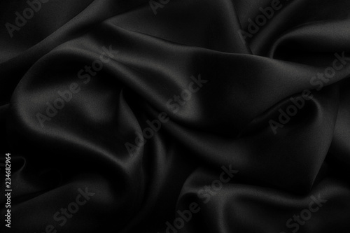 Black satin silk, elegant fabric for backgrounds photo