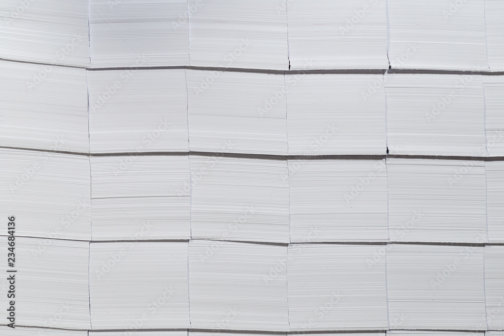 Close-up stacks of white paper. The pre-cut cards from thick paper. Close-up stacks of white paper. The pre-cut cards from thick paper.