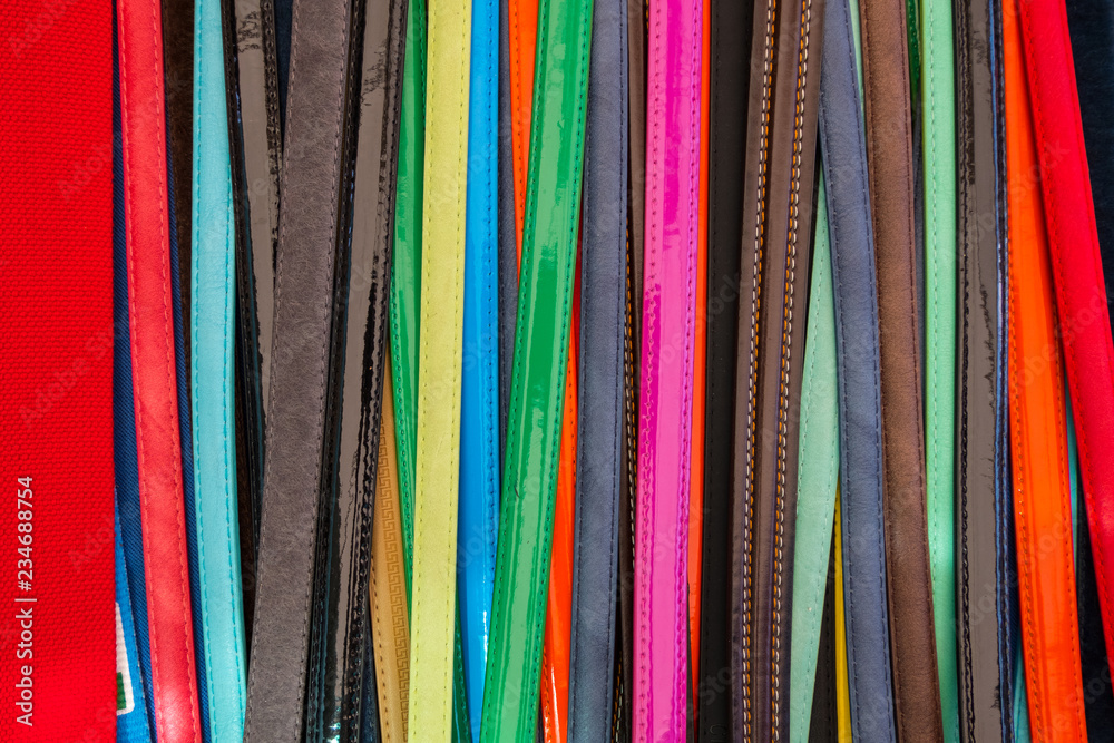 Colorful leather belts for women and men.