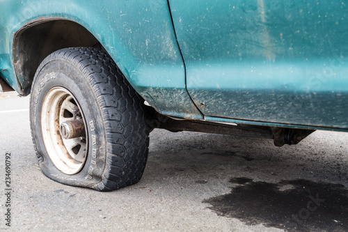 Car with a flat tire