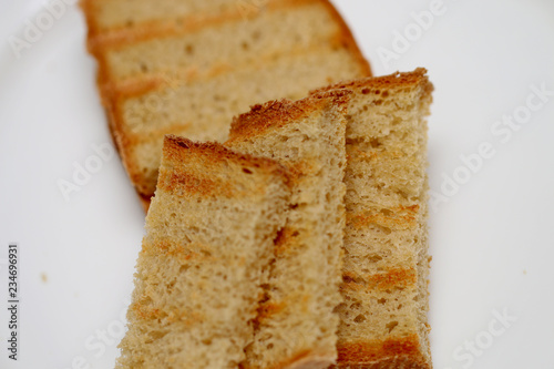 Wallpaper Mural Bread of fried croutons on a white background Torontodigital.ca