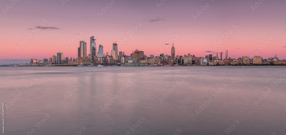 Panorama of Midtown Manhattan at sunset from the hudson river