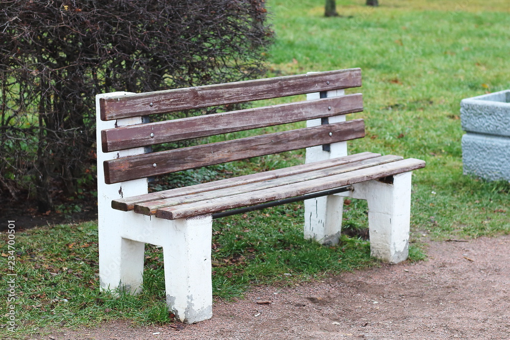 Concept ugly old bench in park, poor infrastructure in city. there is no budget for beautification of parks Concept ugly old bench in park, poor infrastructure in city. there is no budget for beautification of parks