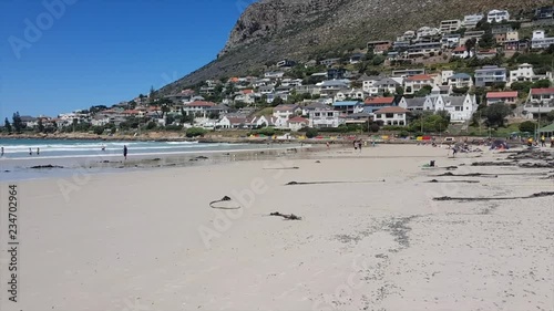 Fishhoek Beach with Tractor on it cleaning up Seaweed