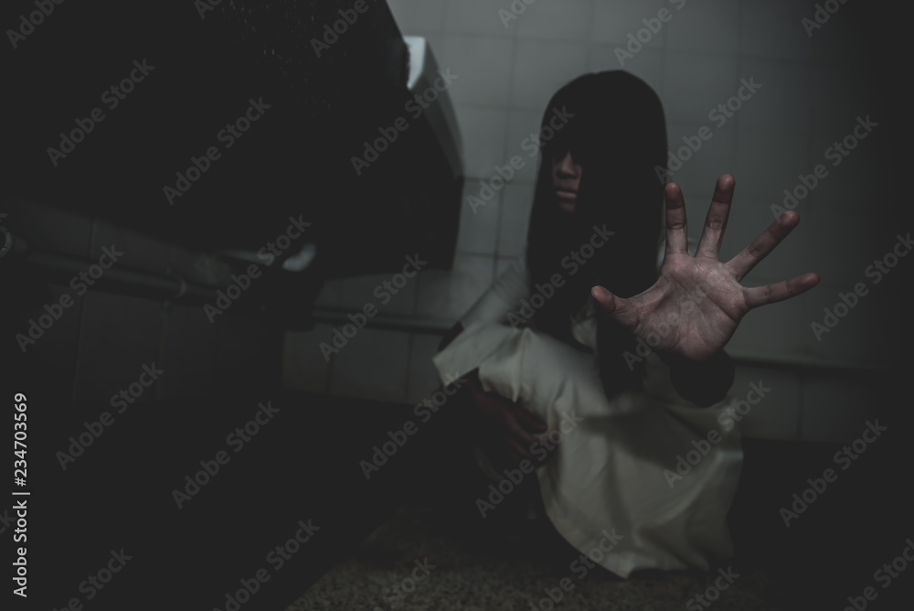 Portrait of asian woman make up ghost face with blood,Horror scene,Scary background,Halloween poster,Thailand people Portrait of asian woman make up ghost face with blood,Horror scene,Scary background,Halloween poster,Thailand people