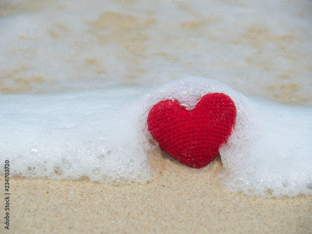 Picture of red heart on the beach sand. Picture of red heart on the beach sand.
