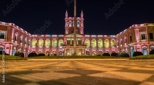 View on illuminated pink presidential palace in Asuncion, Paraguay at night