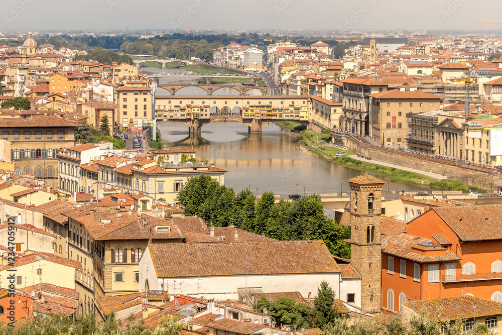 Panoramic view to Florence. Ponte Vecchio bridge in Florence over the Arno river