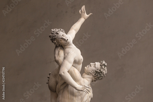 Ancient style sculpture of The Rape of the Sabine Women in Loggia dei Lanzi in Florence photo