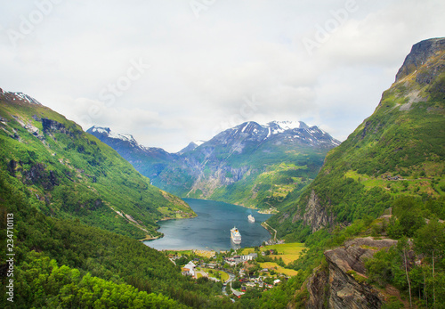 View from the ship on the mountain road and village in Geiranger.