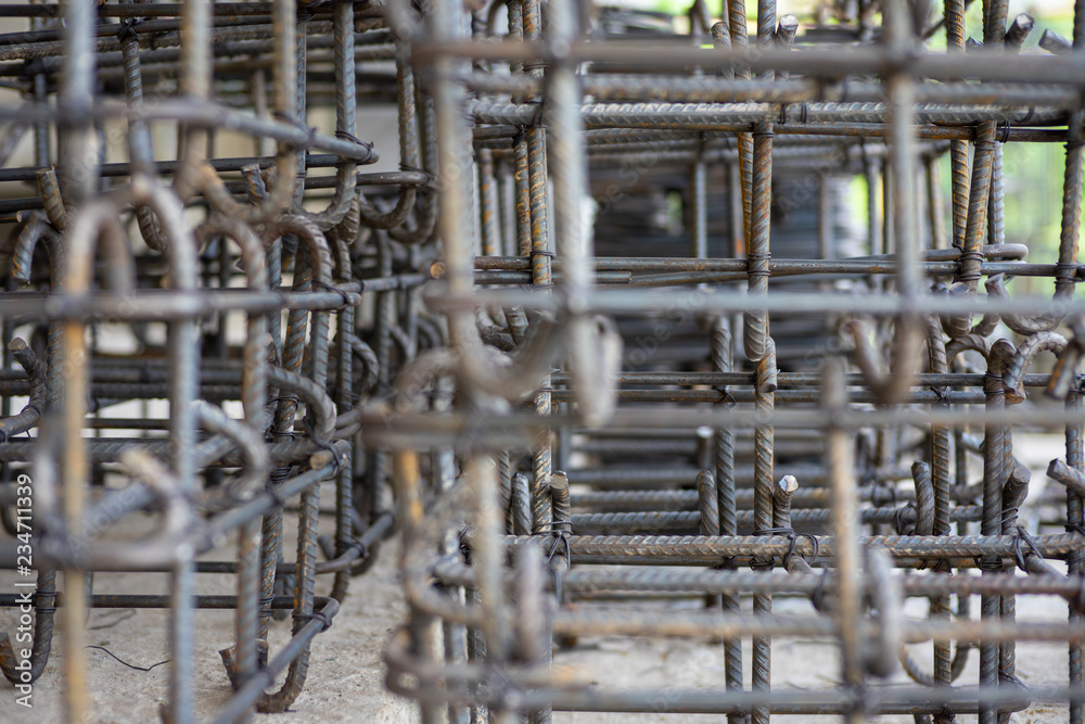 Closeup and selective focus of steelwork for reinforcement the concrete structure at the construction site