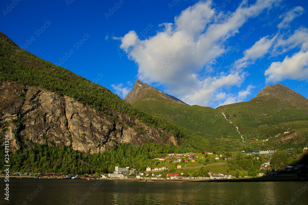 View on the mountain road and village in Geiranger. Norway