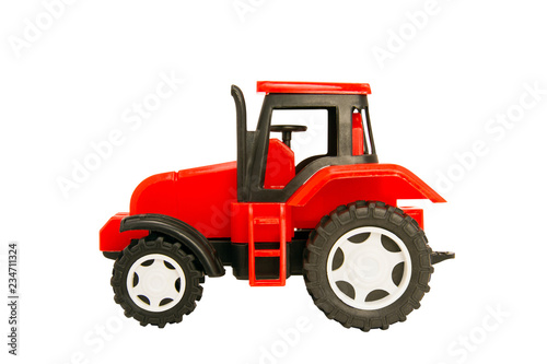 red toy tractor isolated on white background. side view