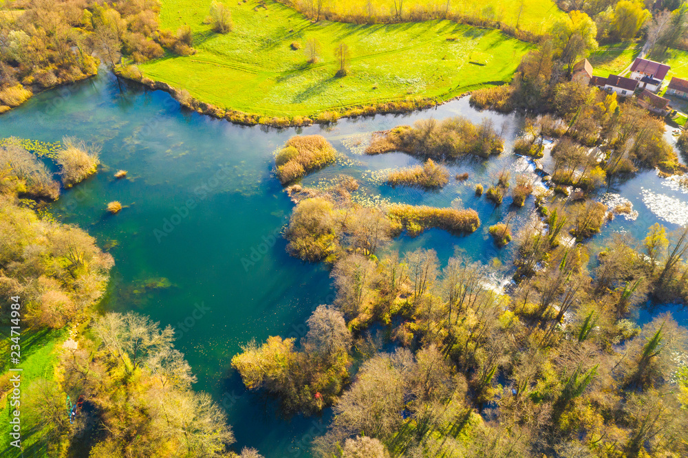      Croatia, Mreznica river from air, panoramic view of Belavici village and waterfalls in autumn 