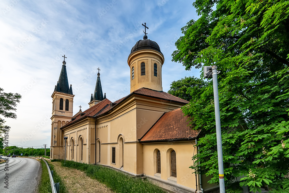 Fototapeta premium Petrovaradin, Serbia - May 02, 2018: Church of the Snow Lady on Tekija, Serbia. The church is a typical Roman Catholic church. 