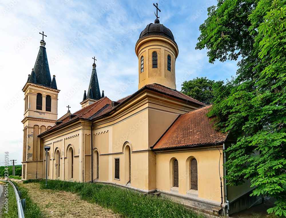 Fototapeta premium Petrovaradin, Serbia - May 02, 2018: Church of the Snow Lady on Tekija, Serbia. The church is a typical Roman Catholic church. 