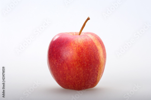 Red apple gala on white background. Front view.