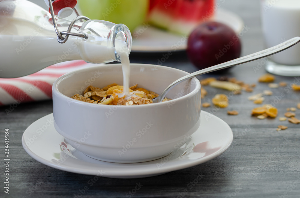Breakfast with dried fruits and milk. Breakfast with dried fruits and milk.