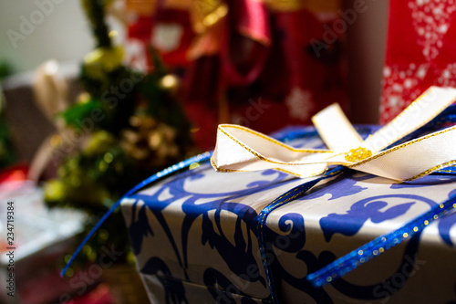 Photography Festive christmas gifts are colourfully packed in a varicoloured paper