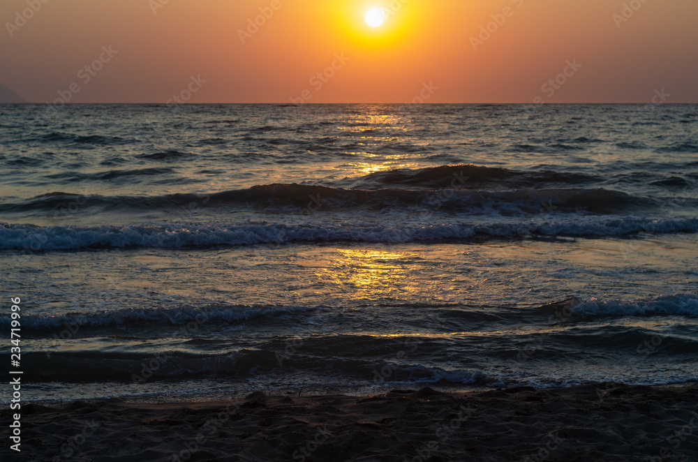 Obraz premium Beautiful red sunset at sea.